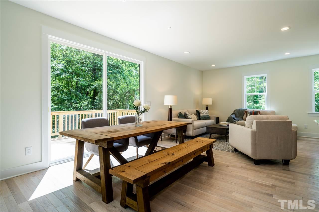 1700 Evergreen Avenue Raleigh, NC 27603 - Photo 11 of 27 a living room with furniture and a window