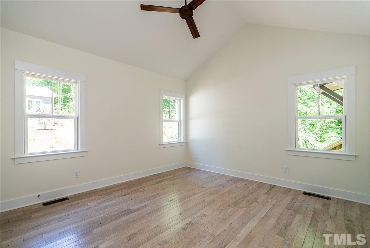 1700 Evergreen Avenue Raleigh, NC 27603 - Photo 18 of 27 a view of a room with wooden floor and windows