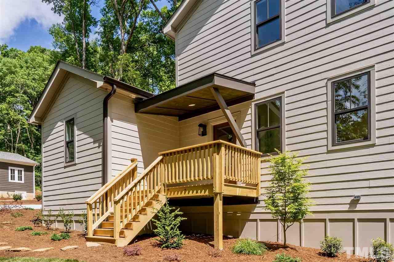 1700 Evergreen Avenue Raleigh, NC 27603 - Photo 4 of 27 a front view of a house with a yard