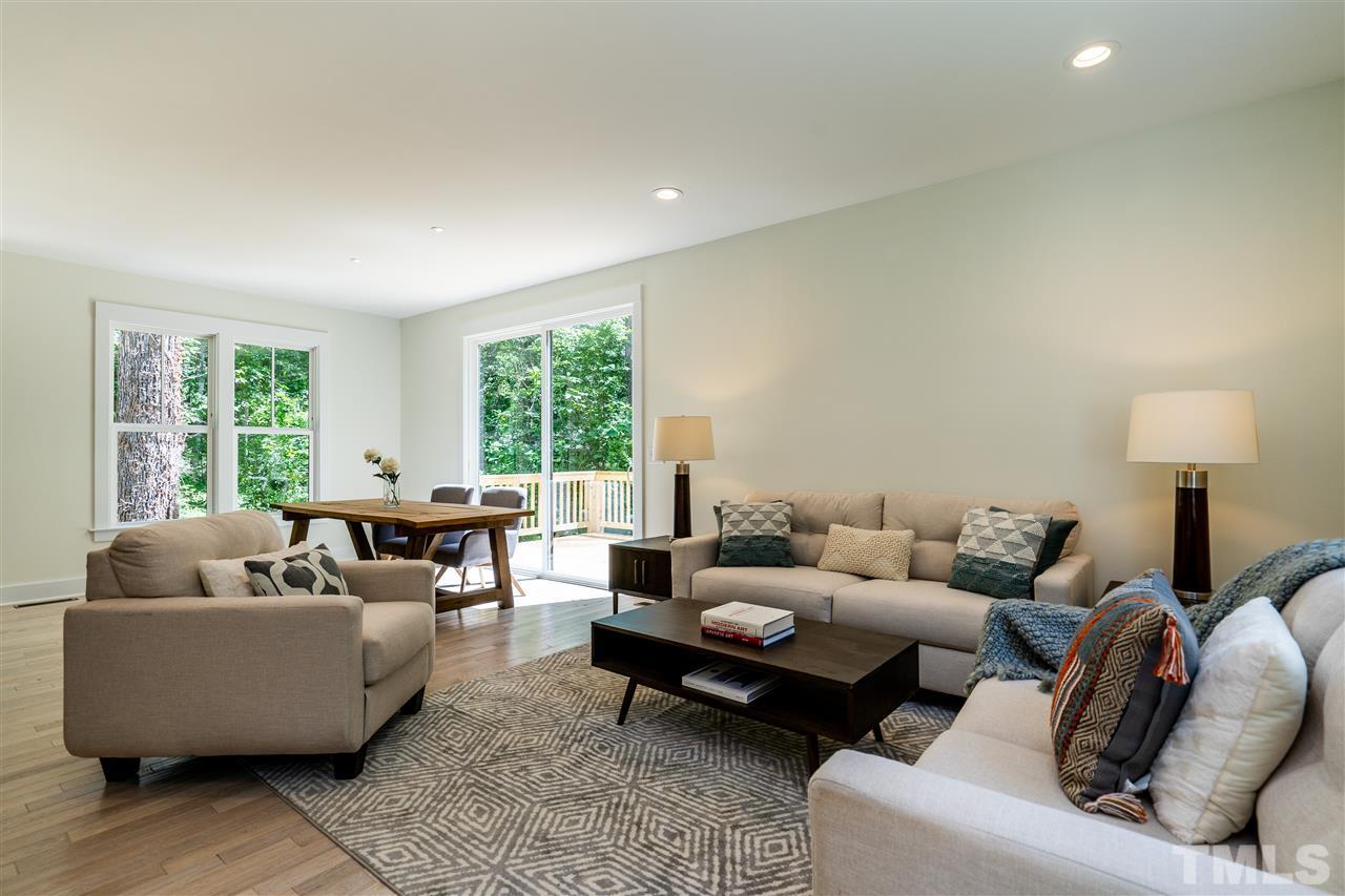 1700 Evergreen Avenue Raleigh, NC 27603 - Photo 6 of 27 a living room with furniture and a window