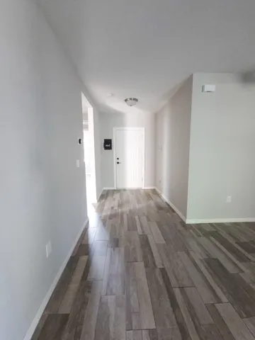 a view of a porch and garden