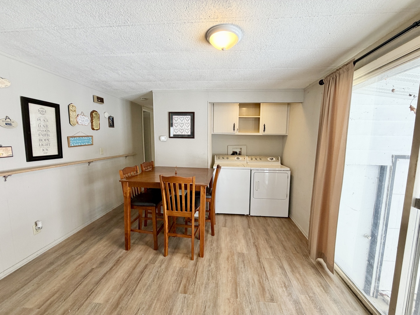 114 Melbrooke Road Elgin, IL 60123 - Photo 14 of 19 a dining room with furniture and wooden floor