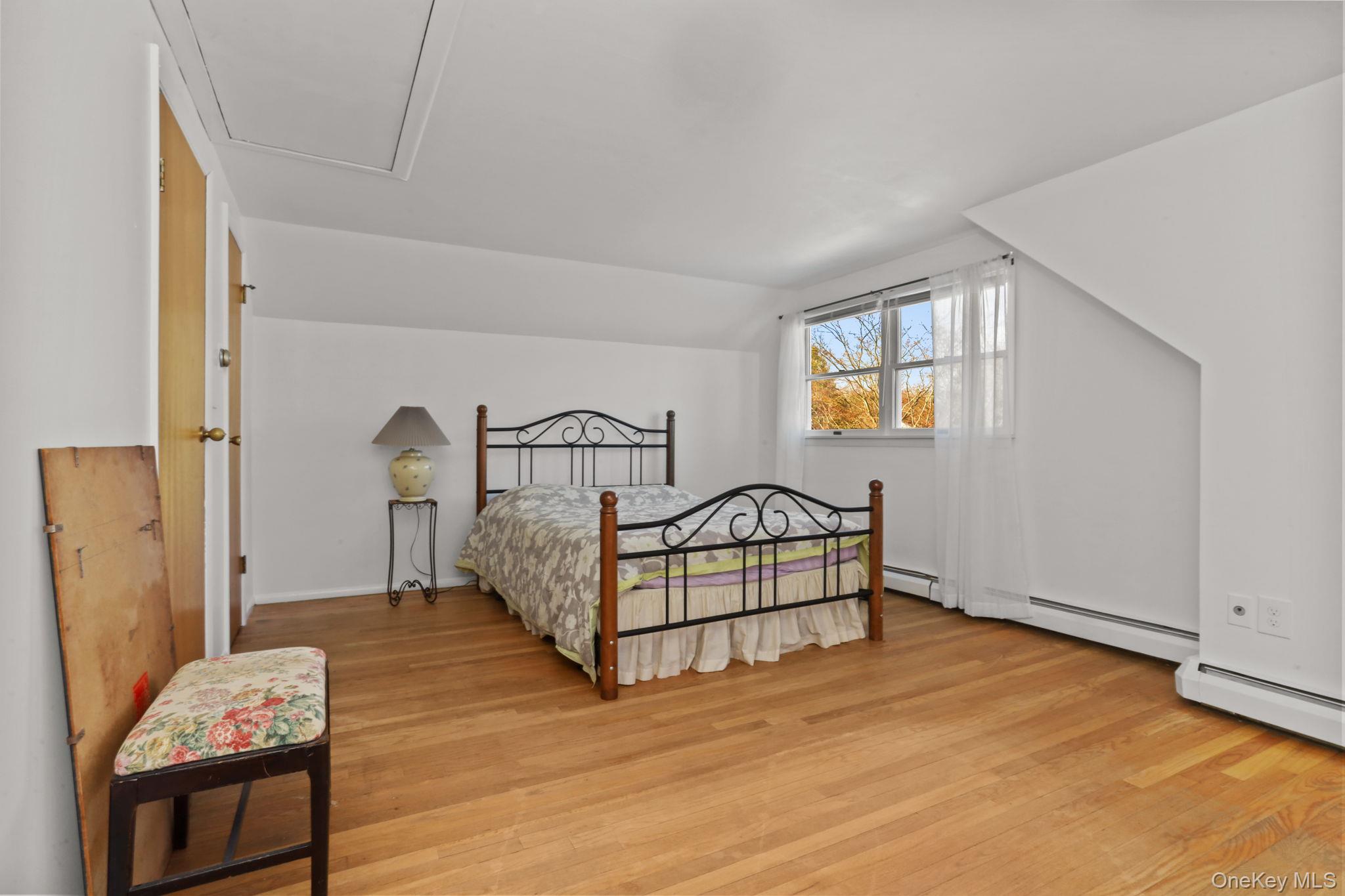 48 Friendly Road Mahopac, NY 10541 - Photo 14 of 24 a bedroom with furniture and a window