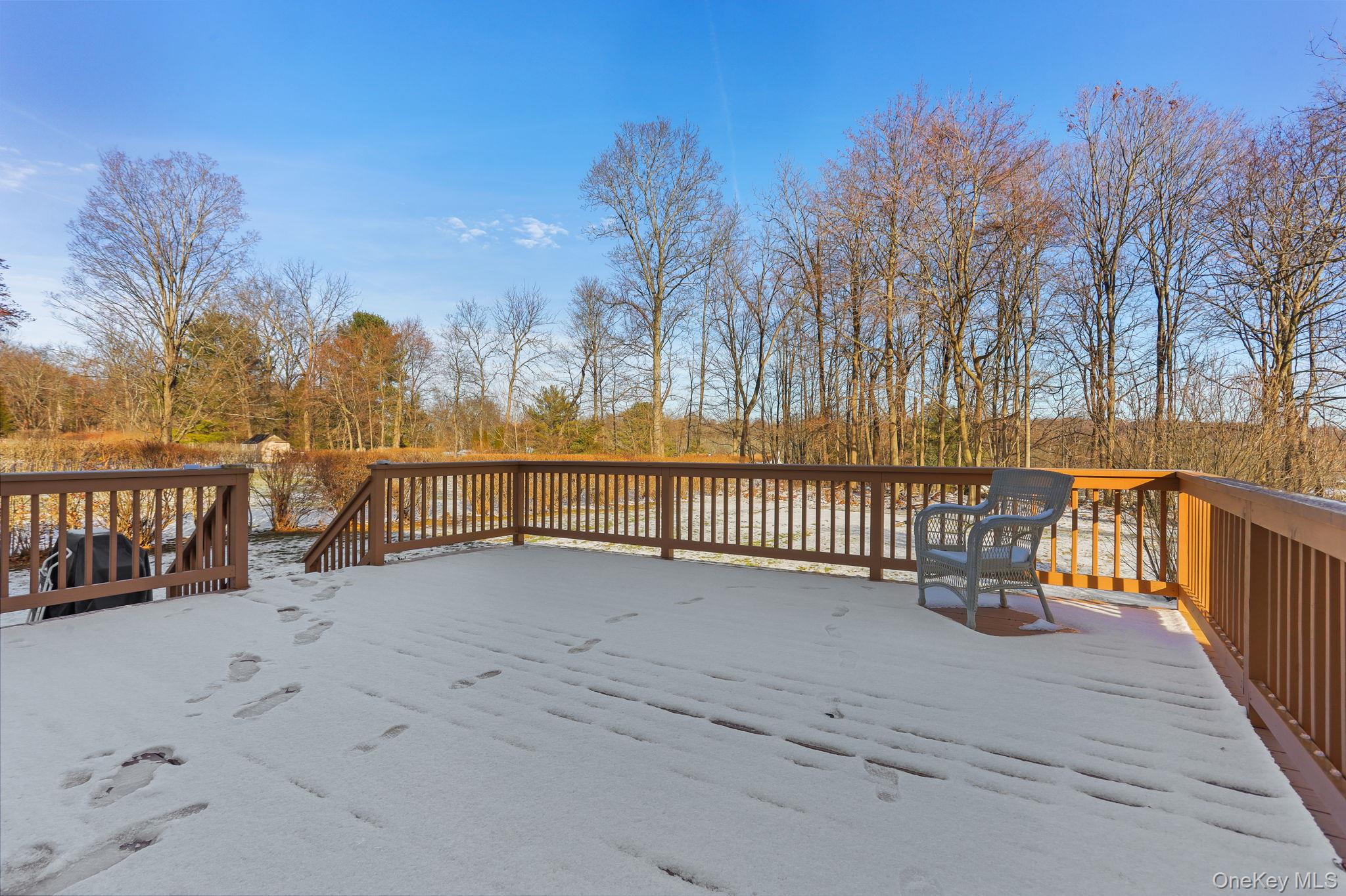 48 Friendly Road Mahopac, NY 10541 - Photo 18 of 24 a view of a pathway with a wrought fence