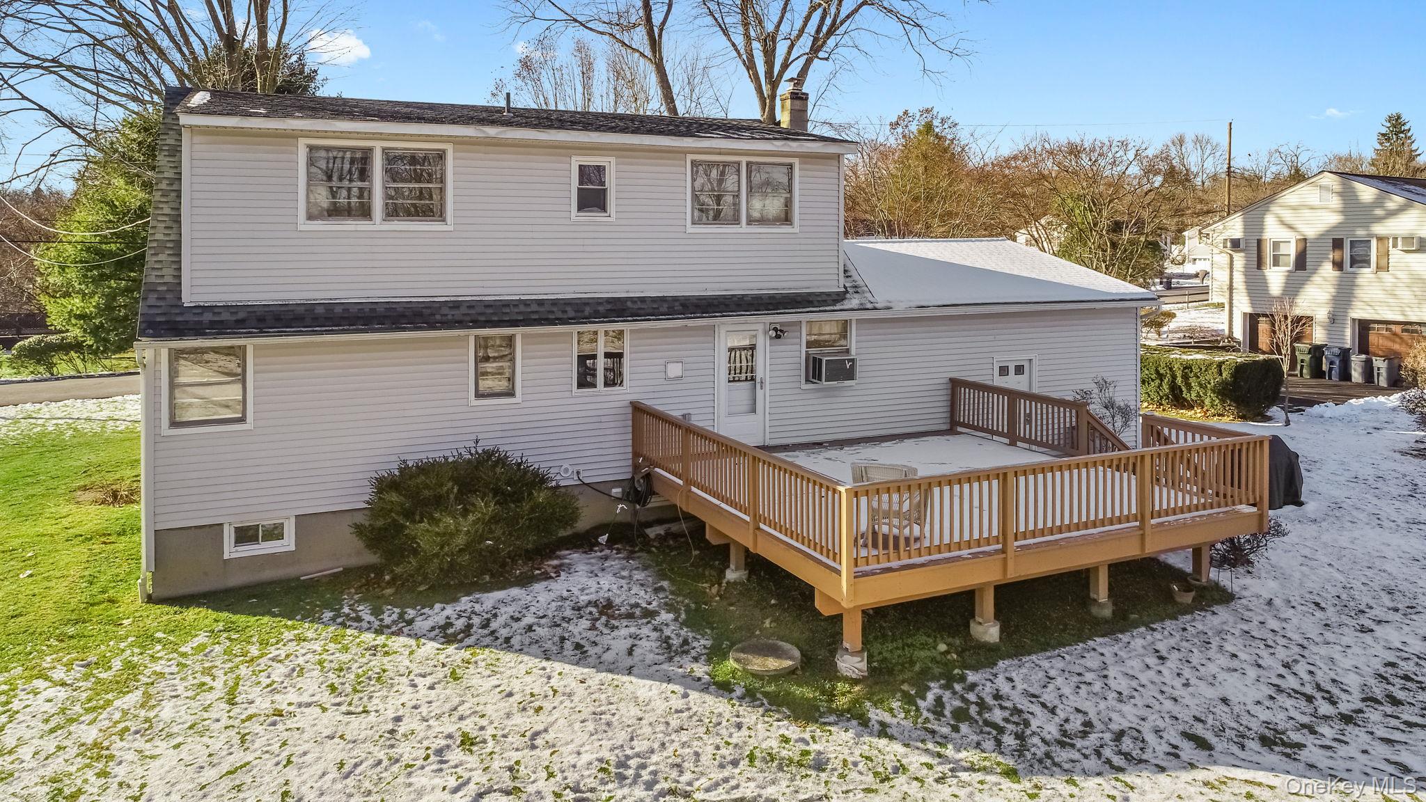 48 Friendly Road Mahopac, NY 10541 - Photo 19 of 24 a view of a house with a yard plants and large tree