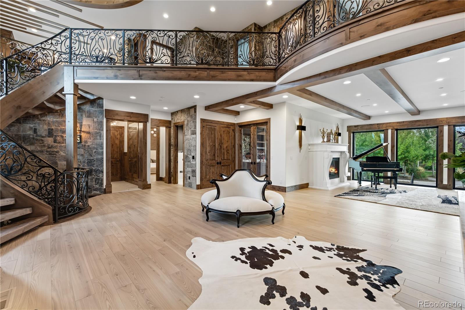 1470 White Hawk Ranch Drive Boulder, CO 80303 - Photo 12 of 50 a living room with furniture and a chandelier
