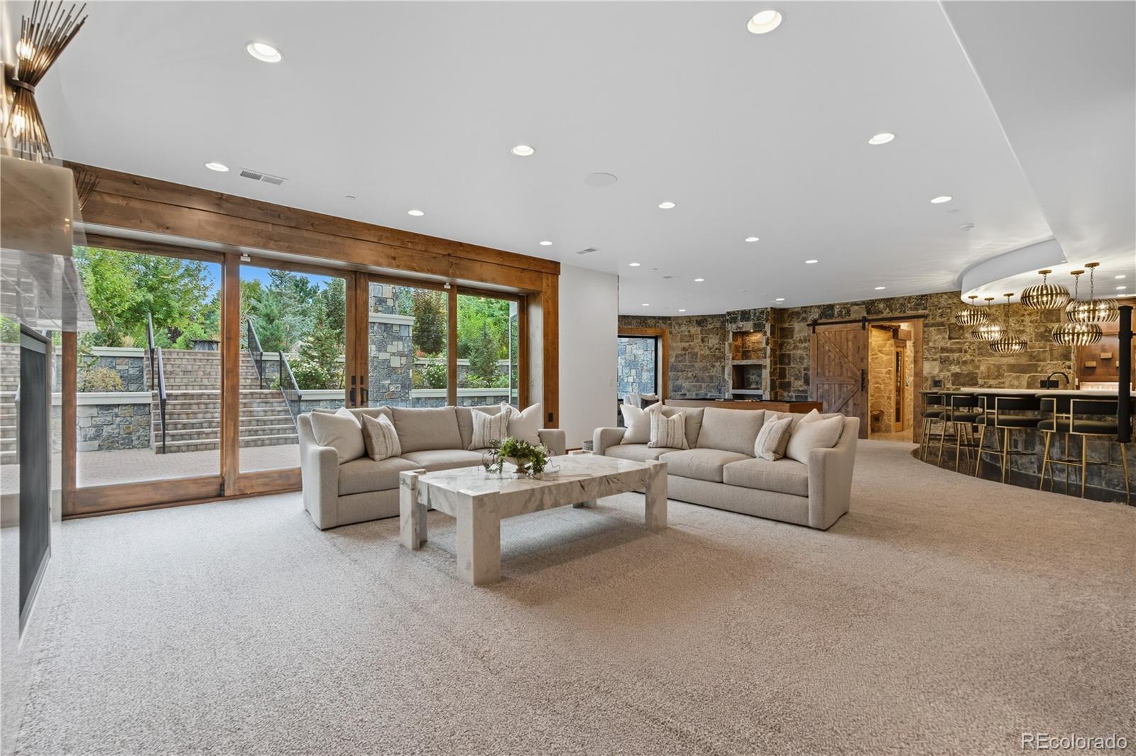 1470 White Hawk Ranch Drive Boulder, CO 80303 - Photo 32 of 50 a living room with furniture and a large window