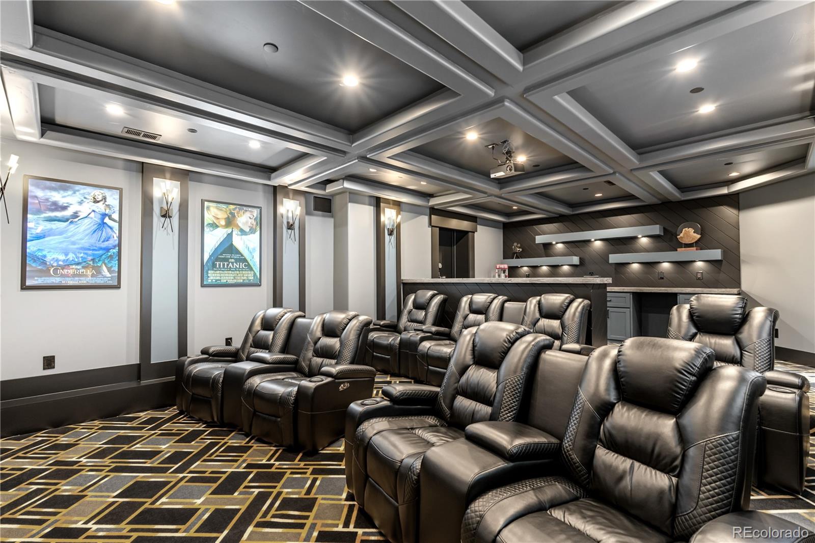 1470 White Hawk Ranch Drive Boulder, CO 80303 - Photo 42 of 50 a media room with lots of chairs and a projector