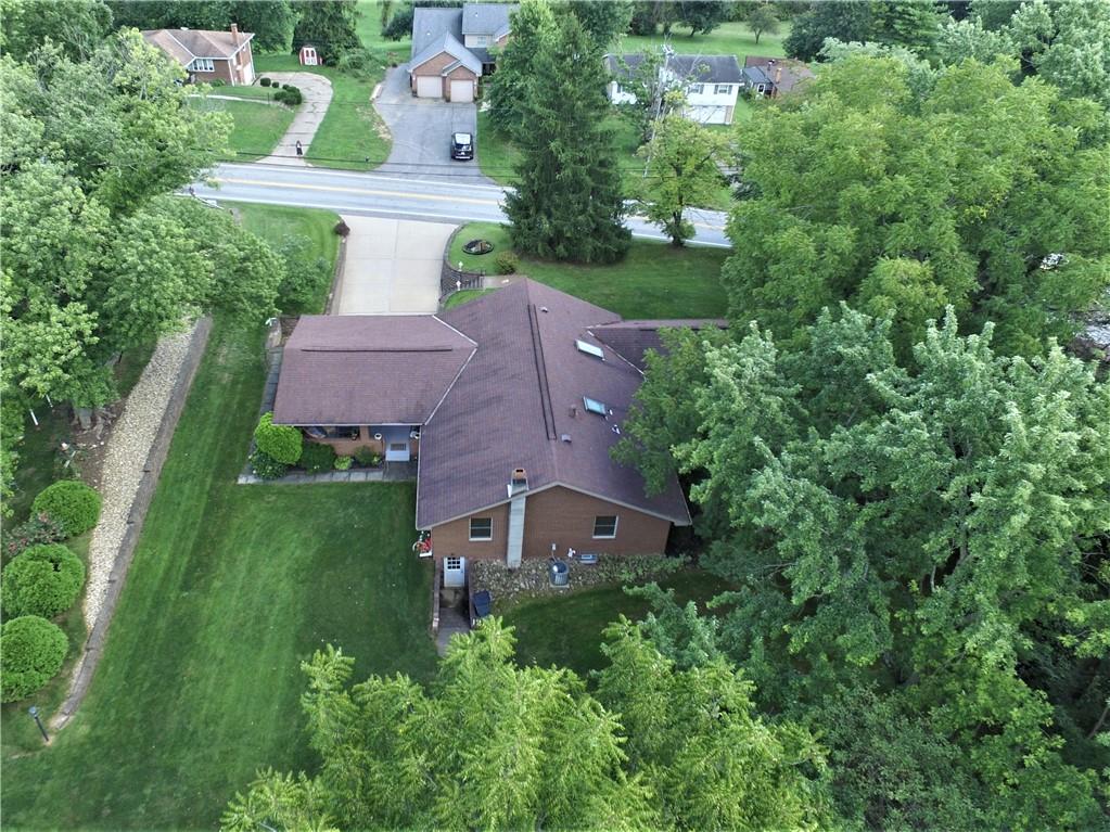 2209 Ridge Road Finleyville, PA 15332 - Photo 25 of 25 Welcome Home!!! Come in, Unpack & Enjoy!!! Roof only 12-15 years, Hot Water Tankless than 10 years, 200 AMP Electric, Dshwasher 2022, Refrigerator 2015, Kitchen & Hardwood Floors appx 15 yrs & Freshly Painted in past 2-5 years
