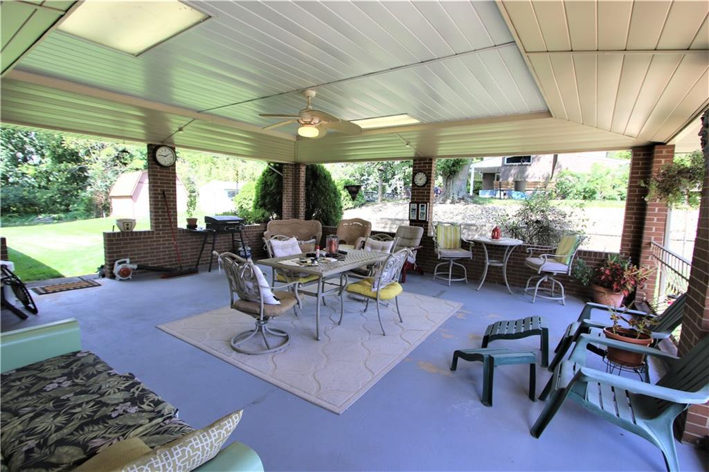2209 Ridge Road Finleyville, PA 15332 - Photo 9 of 25 Awesome 22X22 Covered Porch just off side entry w/ Ceiling Fan Light!