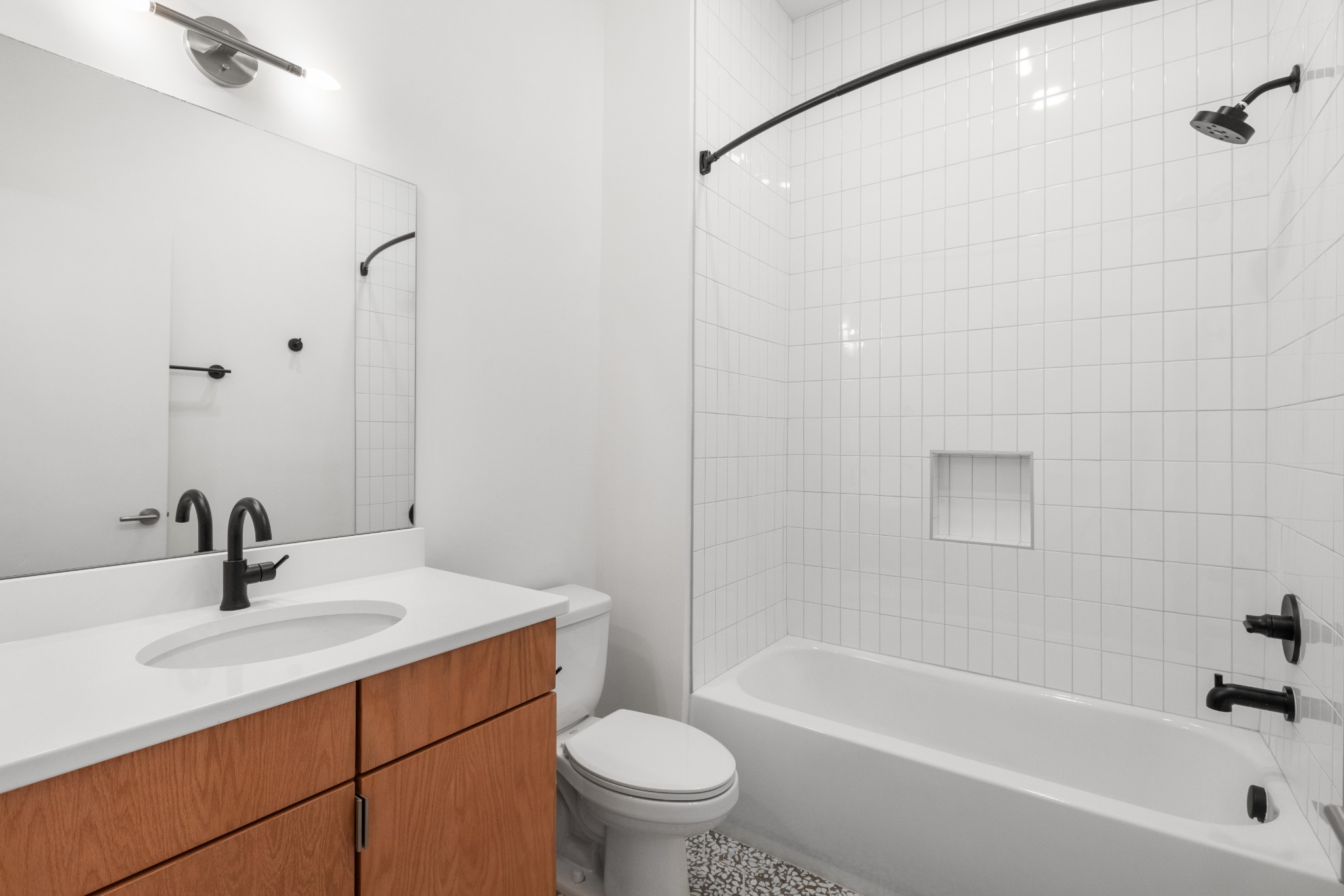1310 Lischey Avenue, Unit 104 Nashville, TN 37207 - Photo 13 of 28 a bathroom with a sink toilet and shower