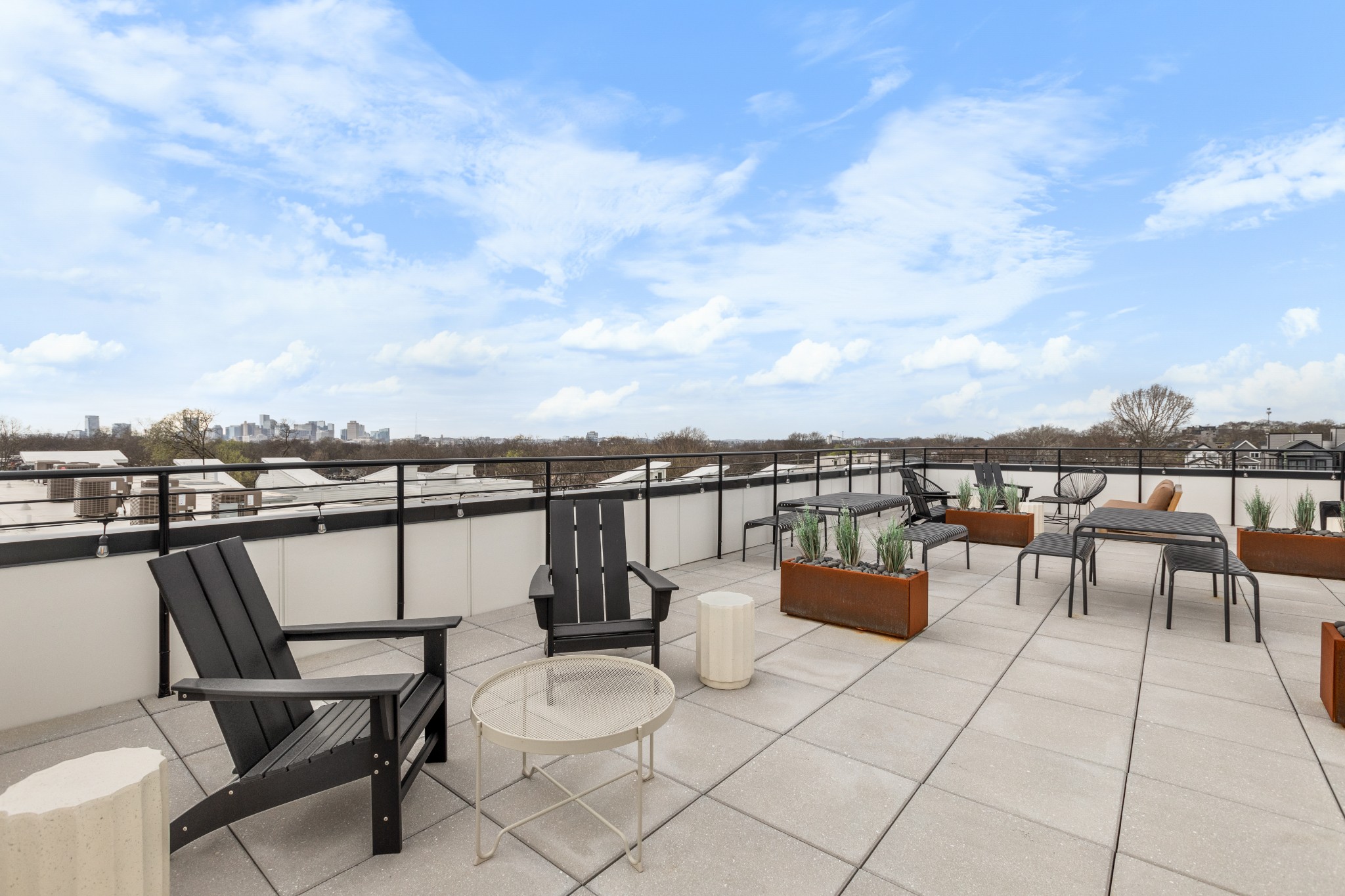 1310 Lischey Avenue, Unit 104 Nashville, TN 37207 - Photo 21 of 28 a terrace with outdoor seating and city view