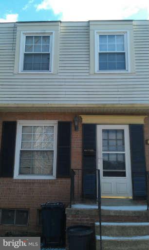 8223 Imperial Drive, Unit 2D Laurel, MD 20708 - Photo 1 of 3 a front view of a house with a door