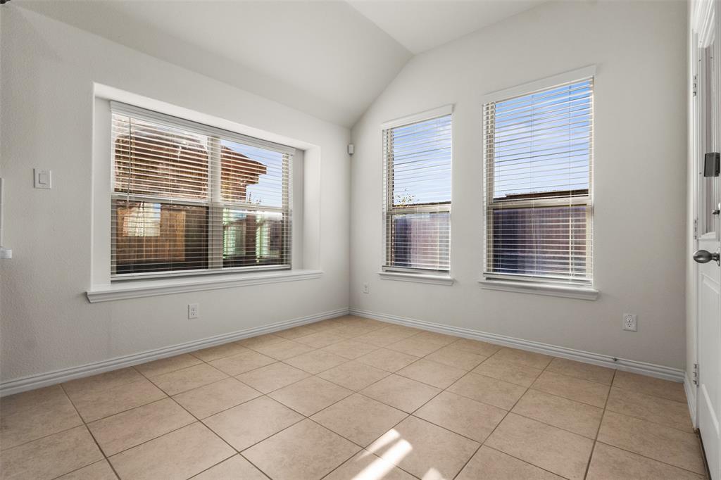 1740 Rio Costilla Road Fort Worth, TX 76131 - Photo 19 of 40 Tile flooring, multiple windows, vaulted ceiling, white walls, white trim
