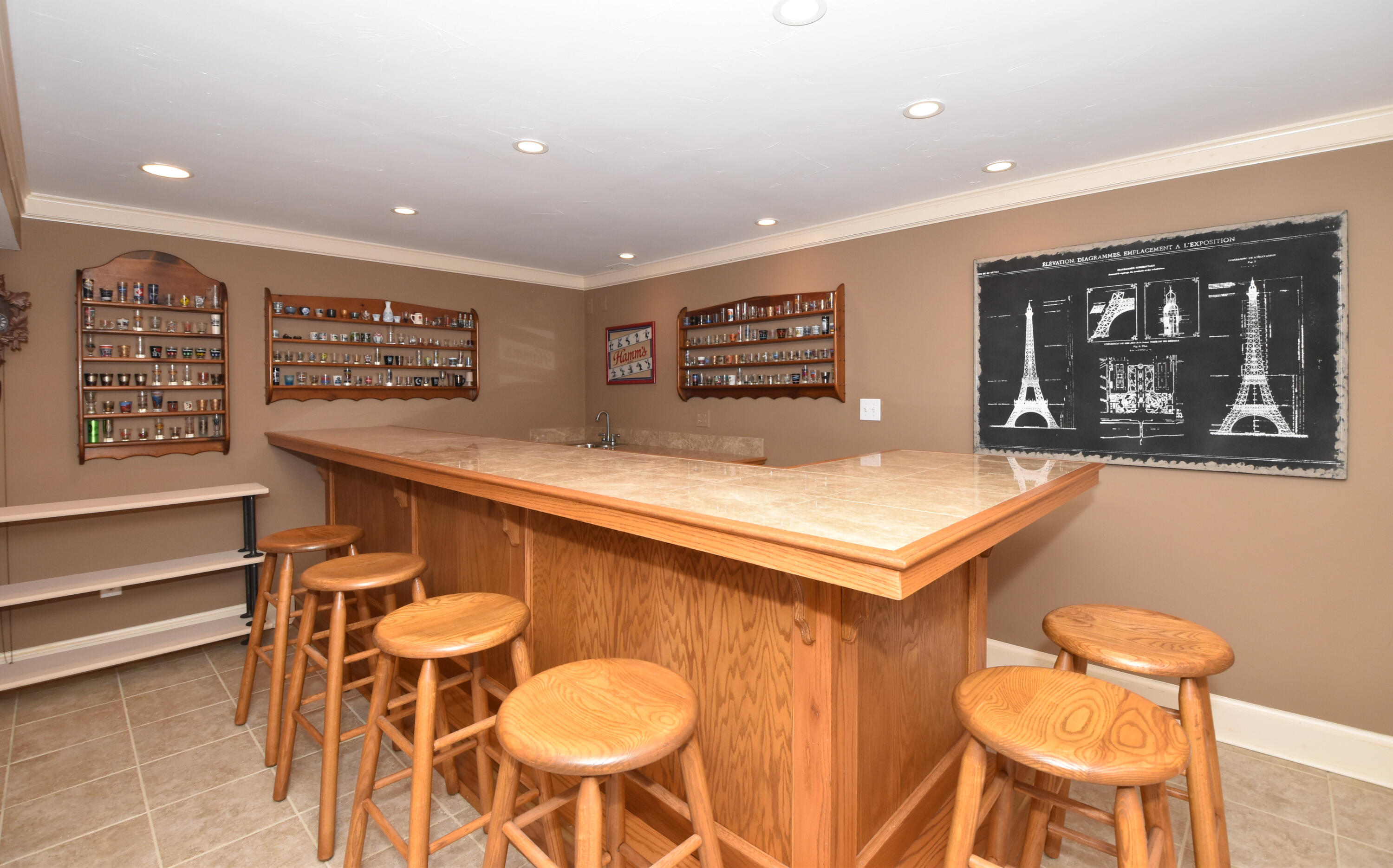 762 North Forest Ridge Court Summit, WI 53066 - Photo 16 of 70 Wet bar. Bar stools included