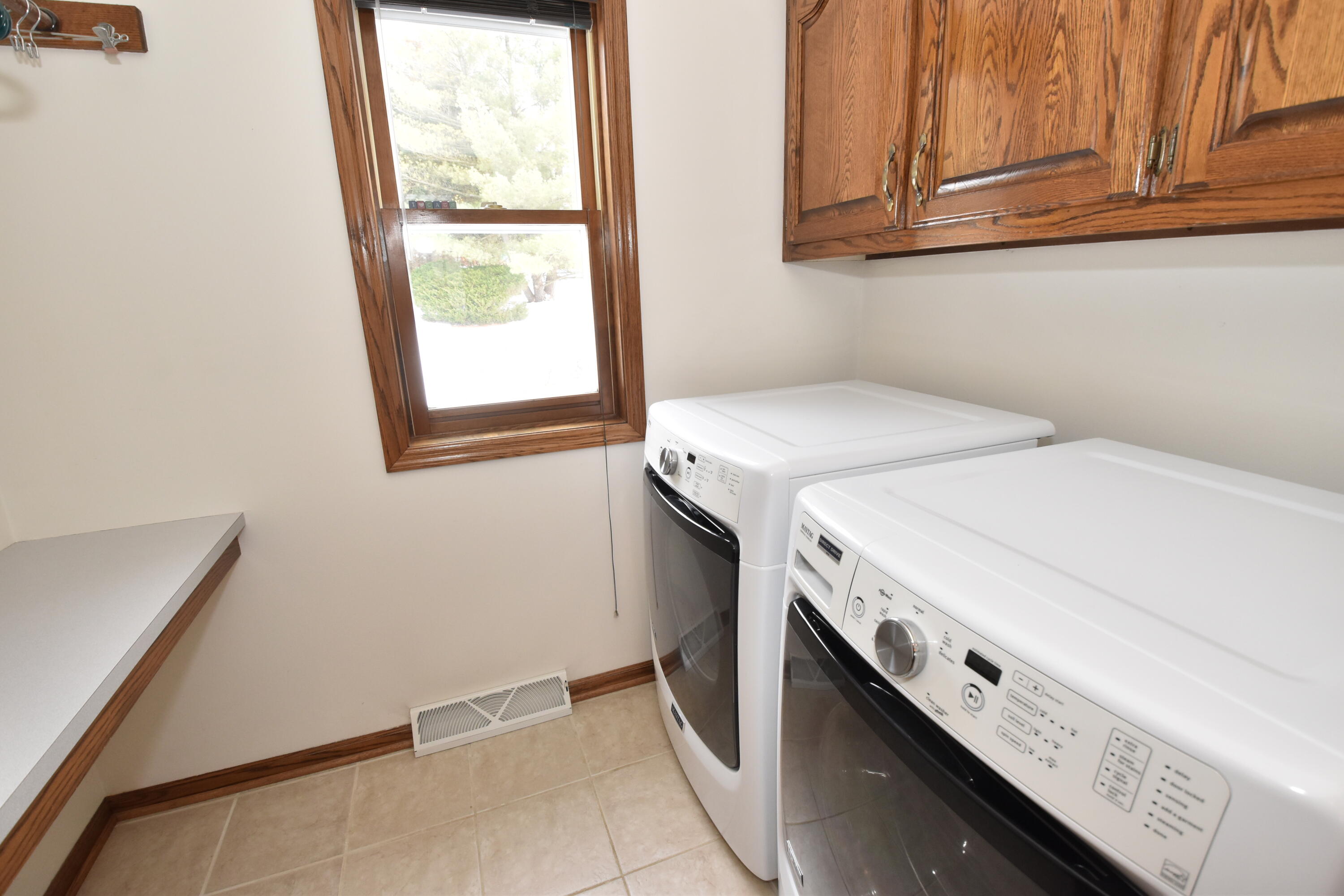 762 North Forest Ridge Court Summit, WI 53066 - Photo 17 of 70 First floor laundry area