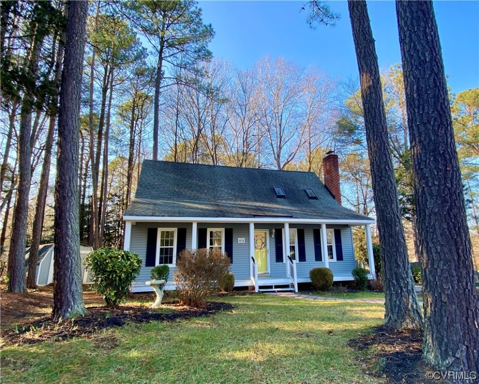 2618 Iverson Road Midlothian, VA 23112 - Photo 2 of 50 a front view of a house with a garden