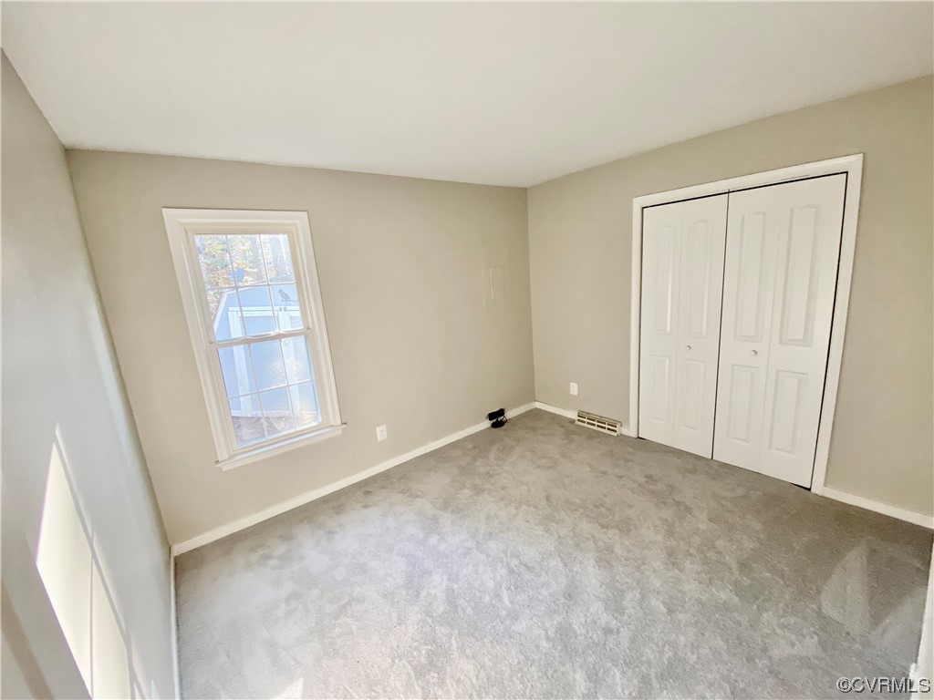 2618 Iverson Road Midlothian, VA 23112 - Photo 25 of 50 an empty room with windows and closet