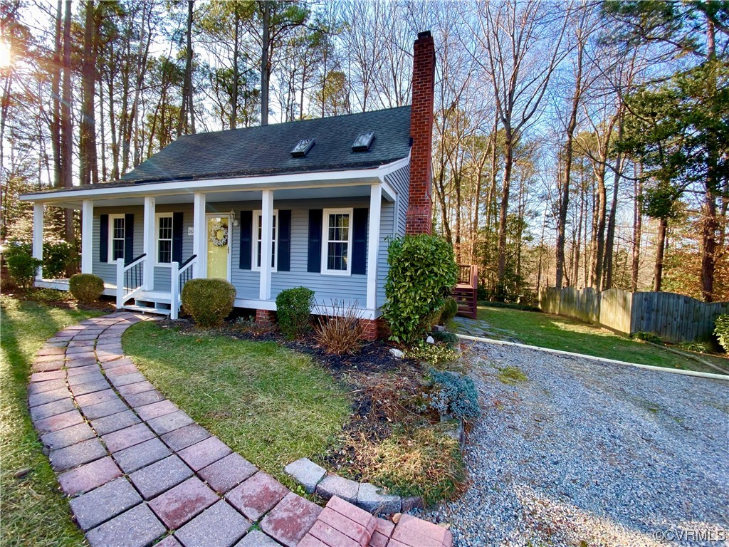 2618 Iverson Road Midlothian, VA 23112 - Photo 3 of 50 a front view of a house with garden