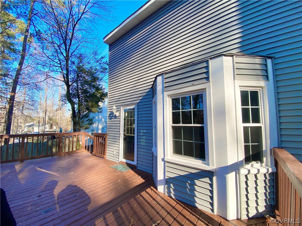 2618 Iverson Road Midlothian, VA 23112 - Photo 42 of 50 a view of a house with backyard and sitting area