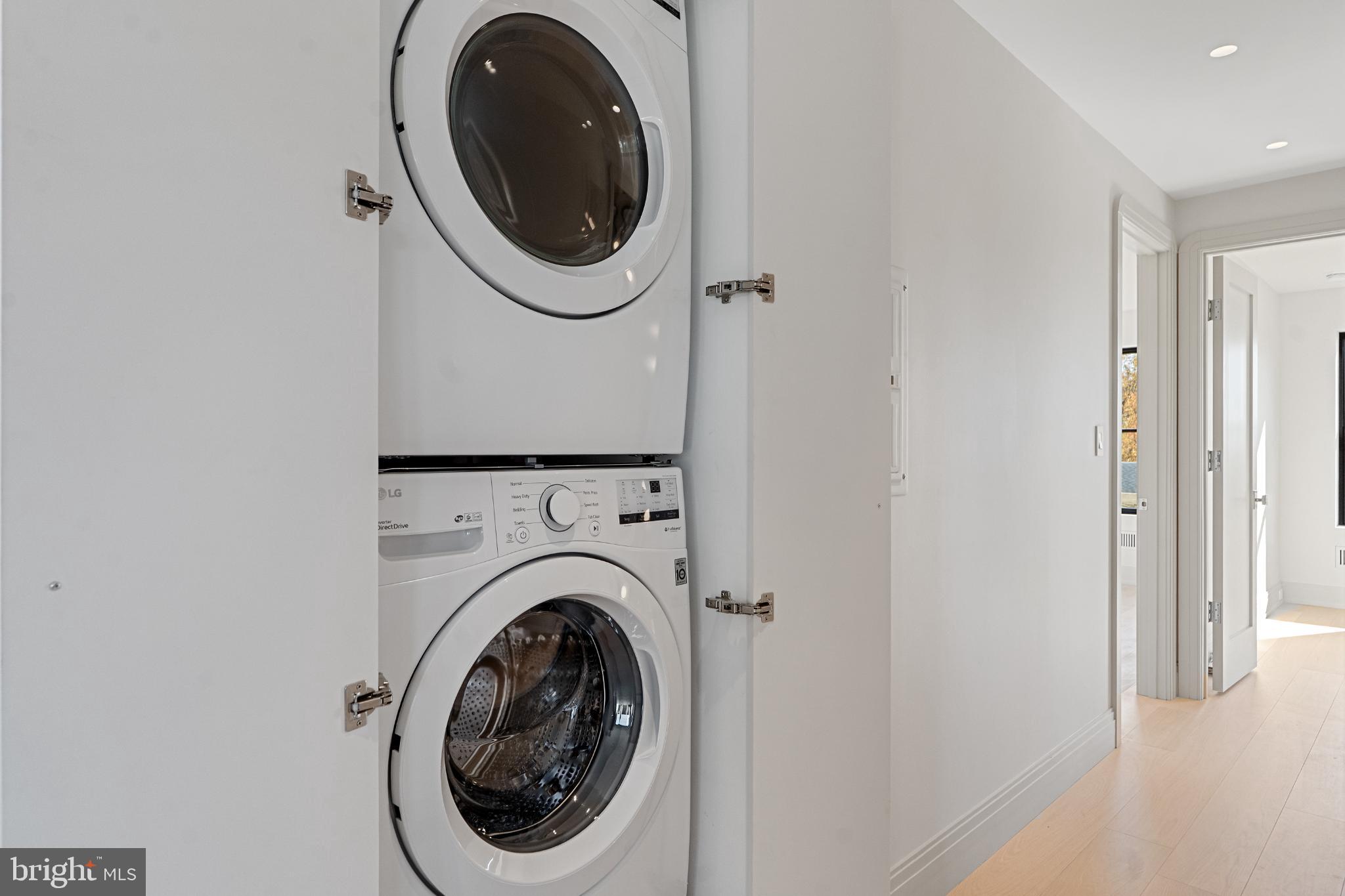 501 Haddonfield-Berlin Road, Unit 2 Voorhees, NJ 08043 - Photo 7 of 18 a utility room with dryer and washer
