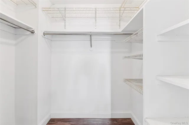 a view of a balcony with wooden floor