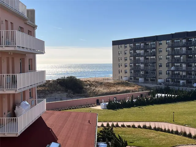a view of a lake with a big yard