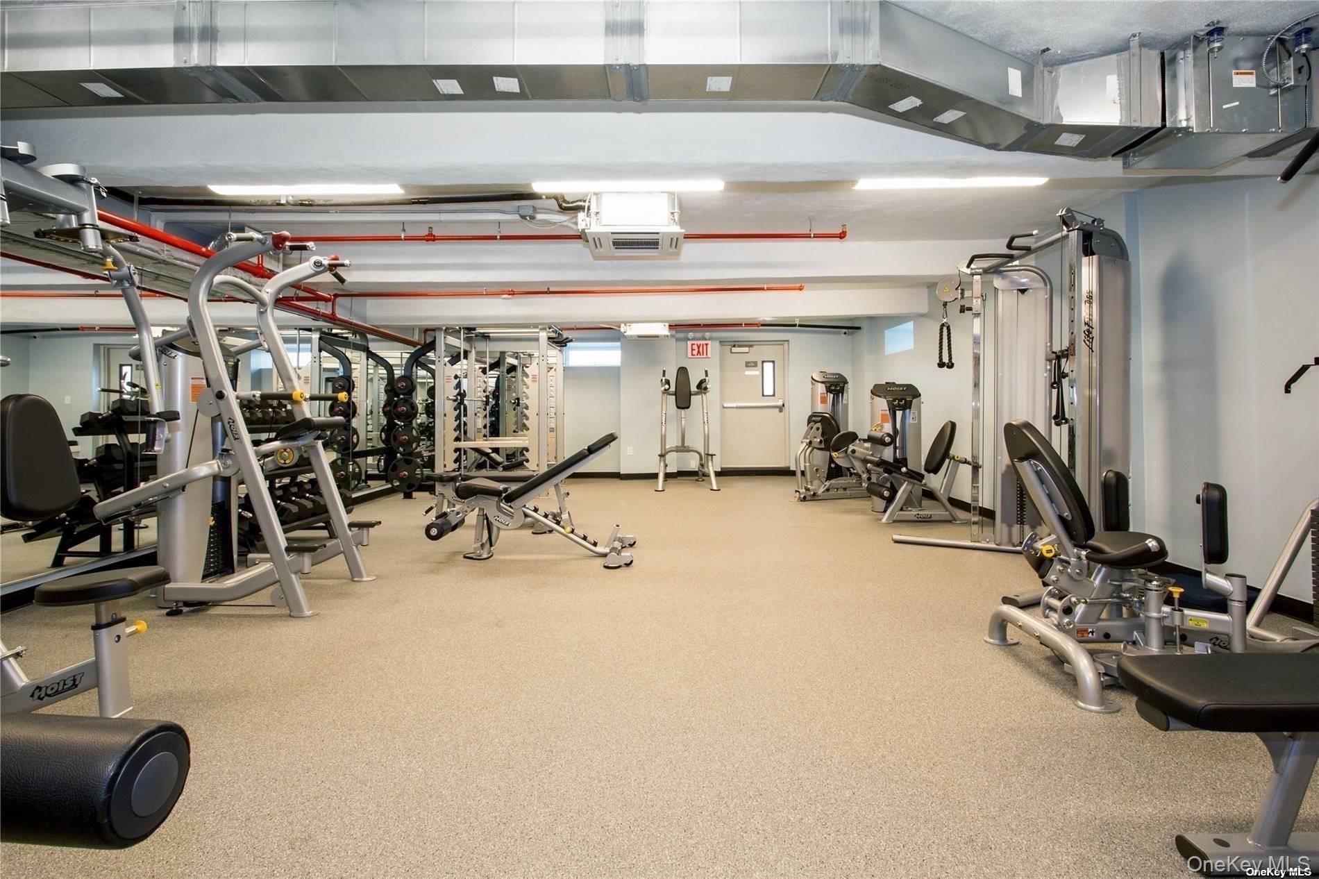2 Richmond Road, Unit 4V Lido Beach, NY 11561 - Photo 8 of 24 a view of a room with gym equipment