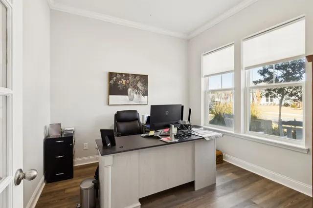a view of a house with a snow in the yard