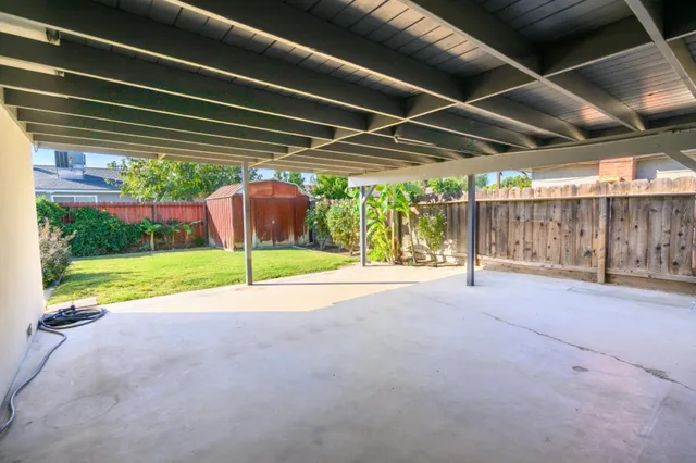 a view of a backyard of a house