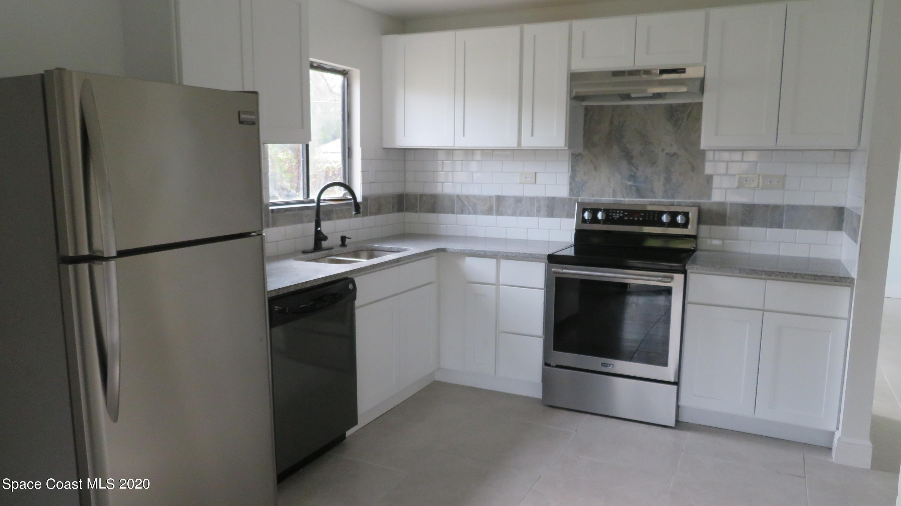 755 Atlantis Road Southeast Palm Bay, FL 32909 - Photo 7 of 21 IMG_6935