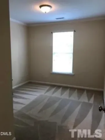 a view of empty room with window