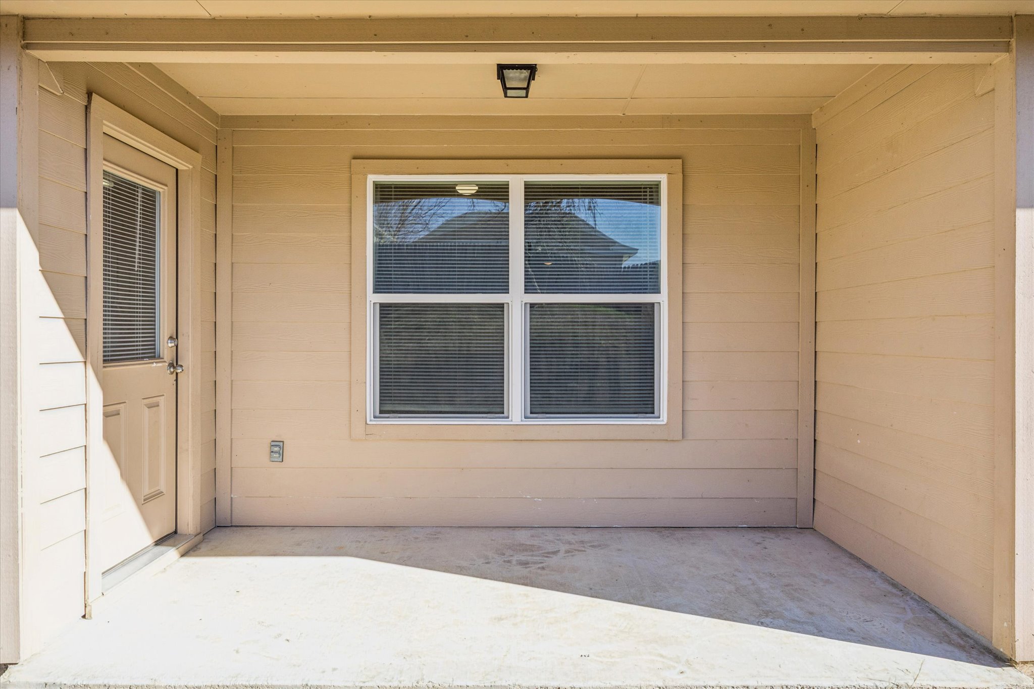 15211 Wideleaf Cove Austin, TX 78724 - Photo 14 of 15 a view of an empty room with a window