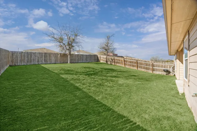a view of a backyard with a garden