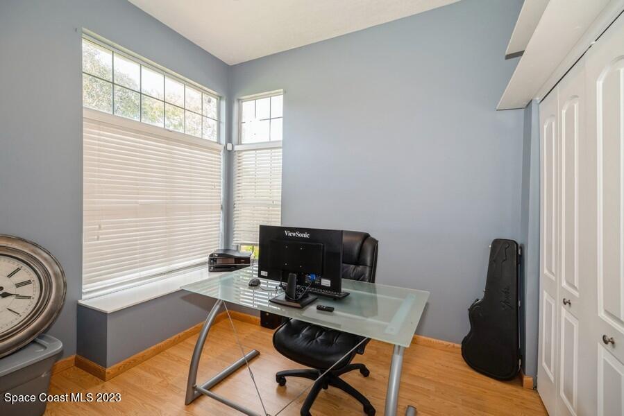 4395 Canard Road Melbourne, FL 32934 - Photo 20 of 36 a view of a workspace with furniture and a window