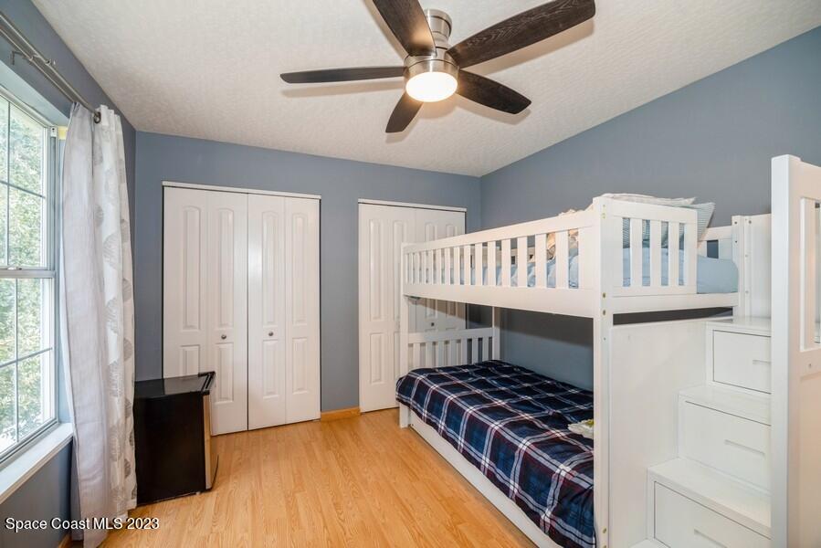 4395 Canard Road Melbourne, FL 32934 - Photo 24 of 36 a bedroom with a bed and a window