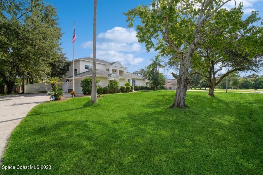 4395 Canard Road Melbourne, FL 32934 - Photo 3 of 36 a view of a park with large trees