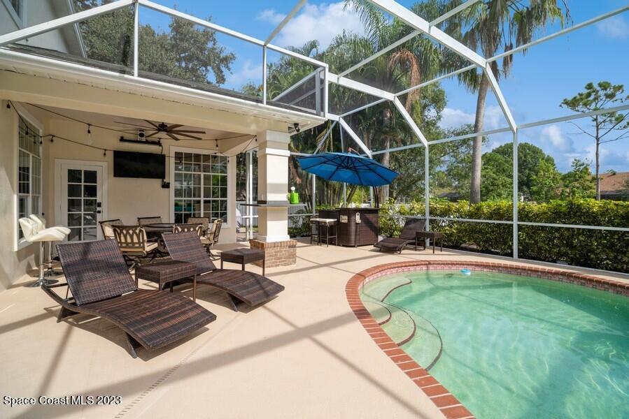 4395 Canard Road Melbourne, FL 32934 - Photo 32 of 36 a view of a house with backyard and sitting area
