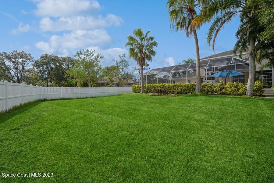 4395 Canard Road Melbourne, FL 32934 - Photo 36 of 36 a view of a yard in front of a house