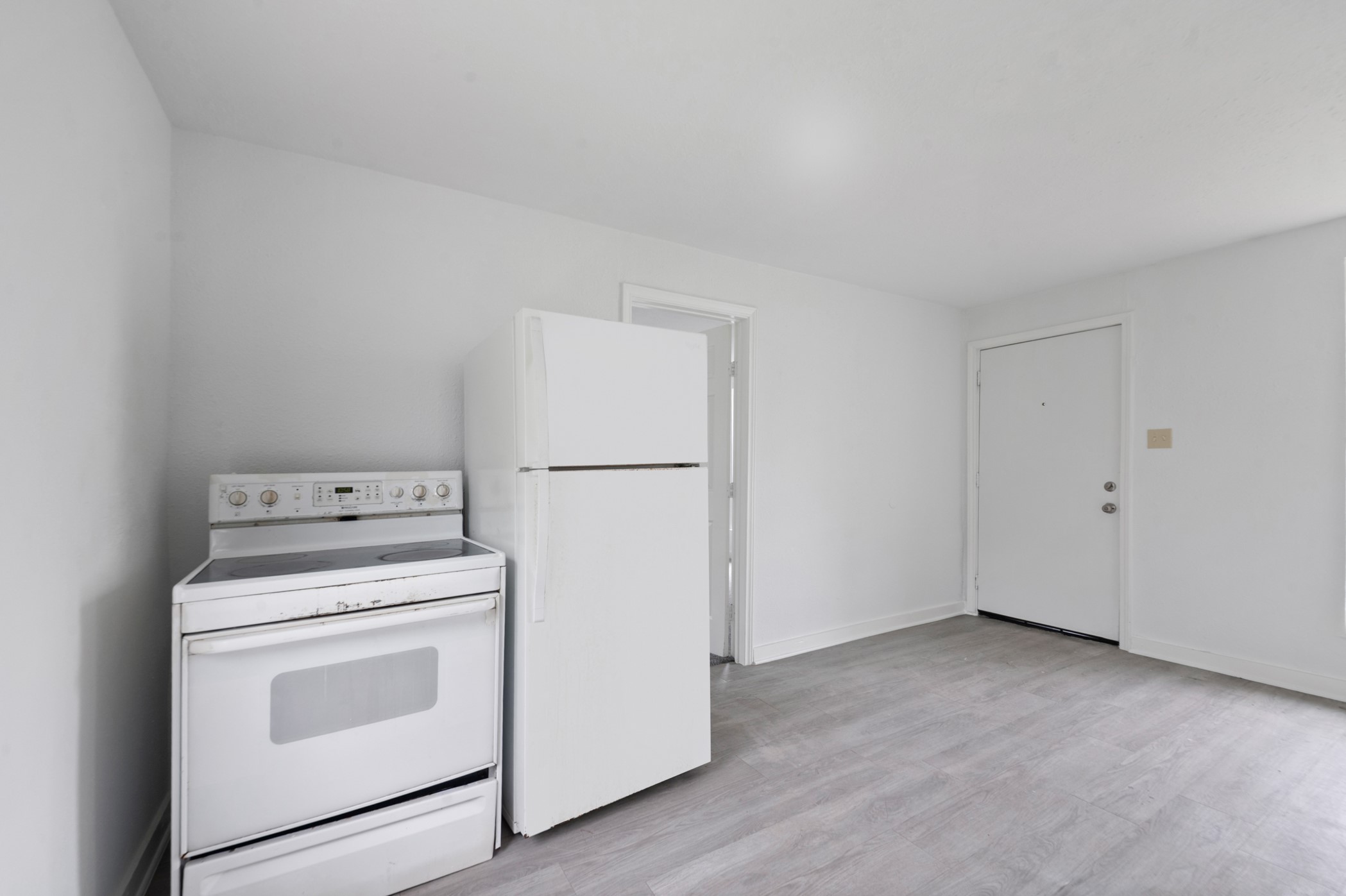 806 East Emily Avenue, Unit 1 Wharton, TX 77488 - Photo 4 of 32 a view of a storage and utility room with washer and dryer