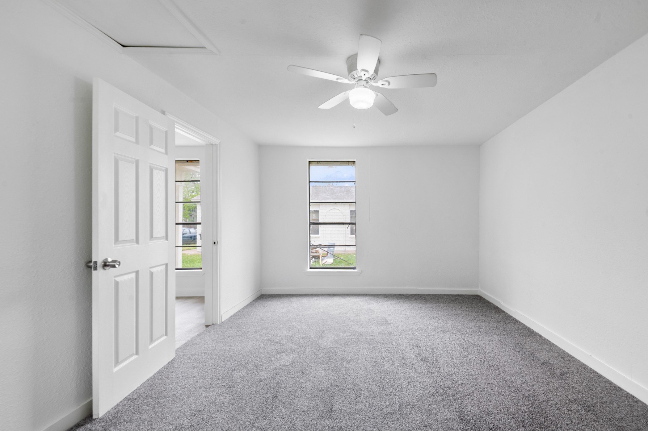 806 East Emily Avenue, Unit 1 Wharton, TX 77488 - Photo 10 of 32 a view of an empty room with a window