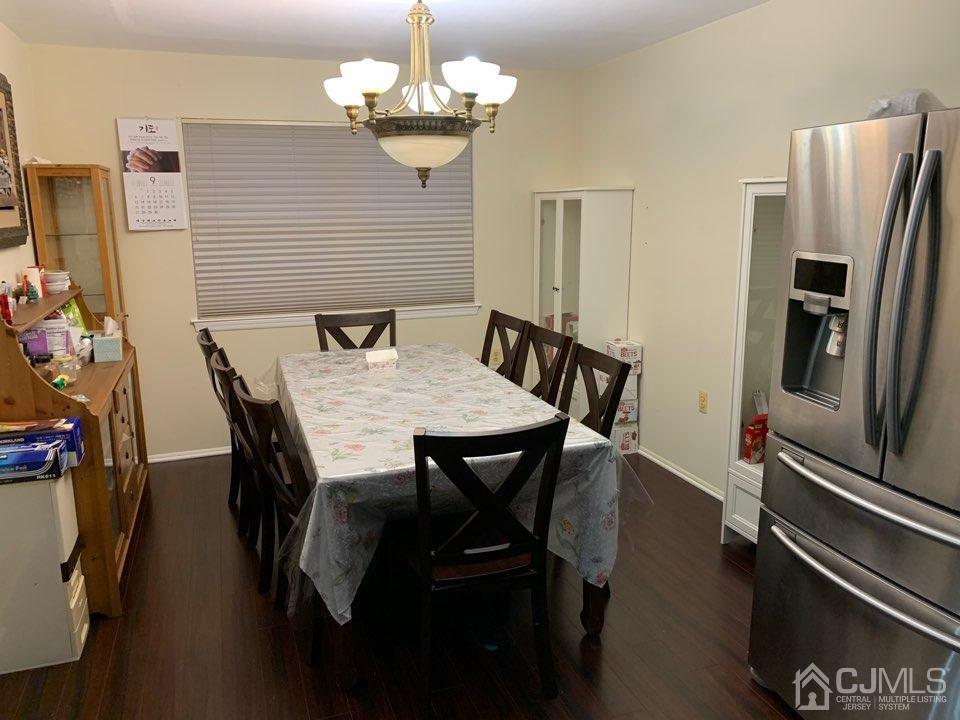 41 Amboy Road Old Bridge, NJ 07747 - Photo 5 of 20 a view of a dining room with furniture and chandelier