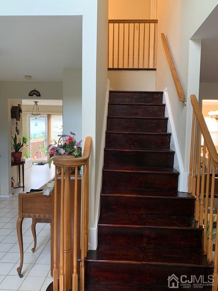 41 Amboy Road Old Bridge, NJ 07747 - Photo 8 of 20 a view of entryway and hall with wooden floor