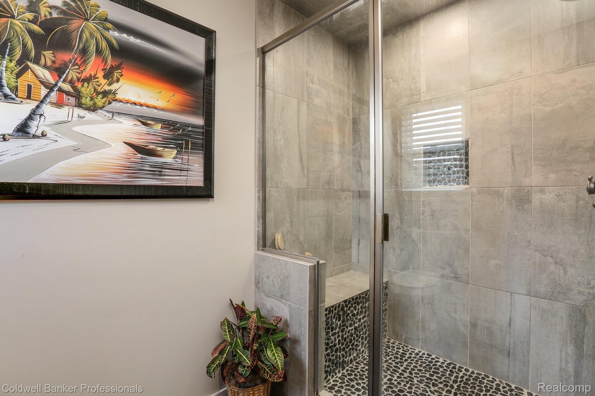 8665 Oakhill Road Clarkston, MI 48348 - Photo 20 of 49 Walk in Master shower with a bench