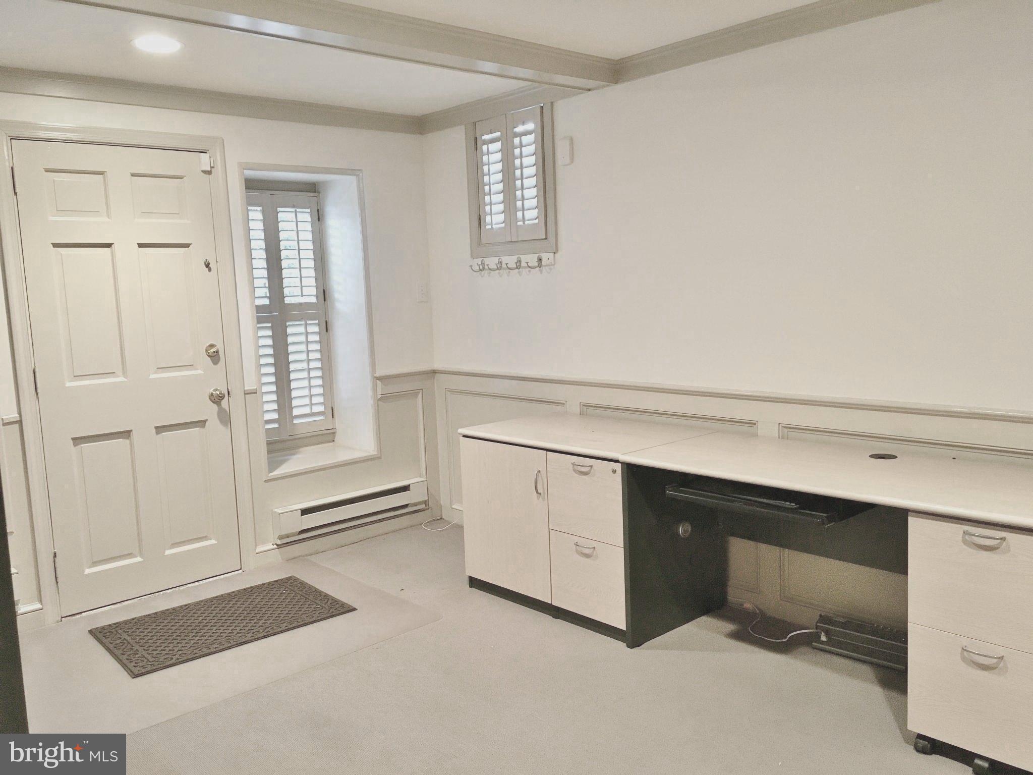 4606 Davidson Drive Chevy Chase, MD 20815 - Photo 21 of 26 a kitchen with white cabinets and white appliances