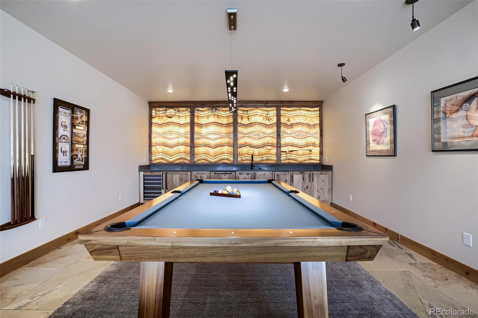 836 Maryland Creek Road Silverthorne, CO 80498 - Photo 17 of 49 a room with furniture pool table and windows