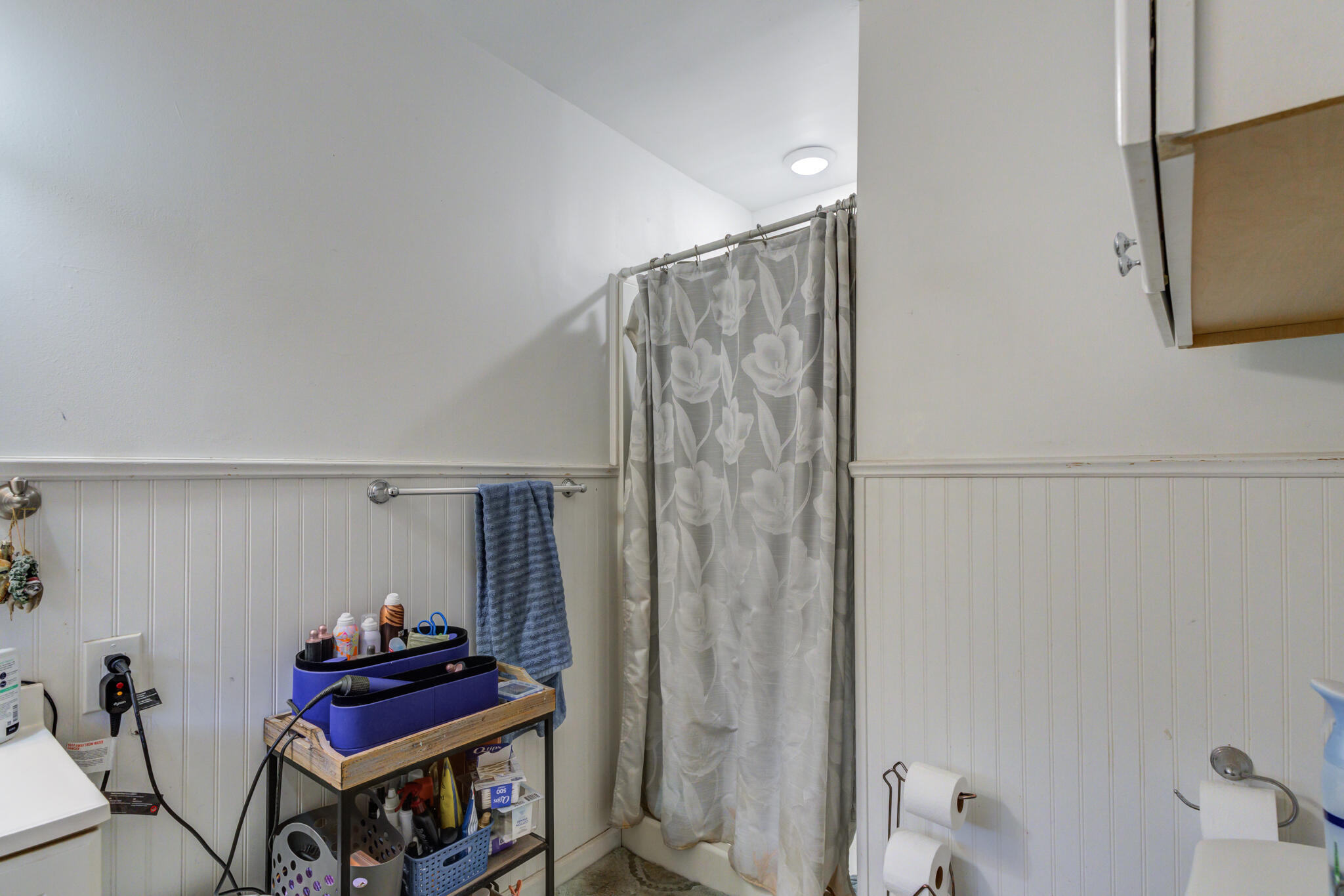 3615 37th Street Lubbock, TX 79413 - Photo 23 of 27 a room with furniture and a book shelf