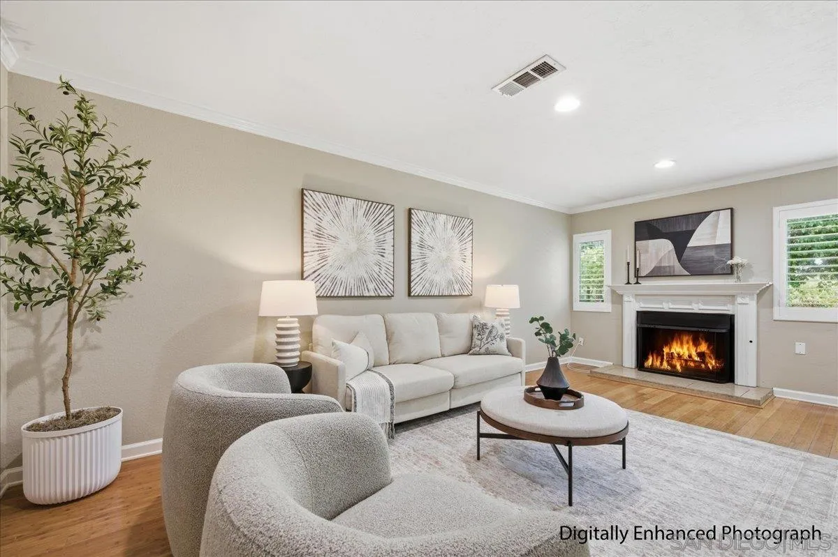 13619 Sycamore Tree Lane Poway, CA 92064 - Photo 4 of 40 a living room with furniture and a fireplace