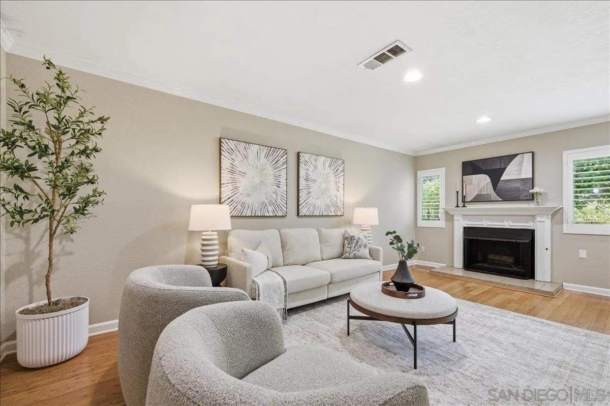 13619 Sycamore Tree Lane Poway, CA 92064 - Photo 5 of 40 a living room with furniture and a fireplace