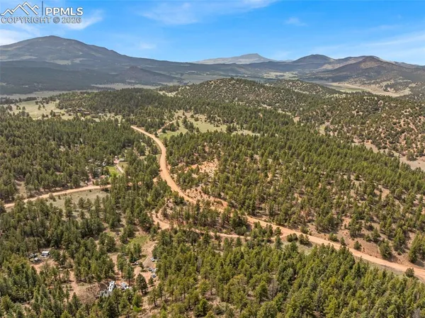 a view of a mountain with an outdoor space